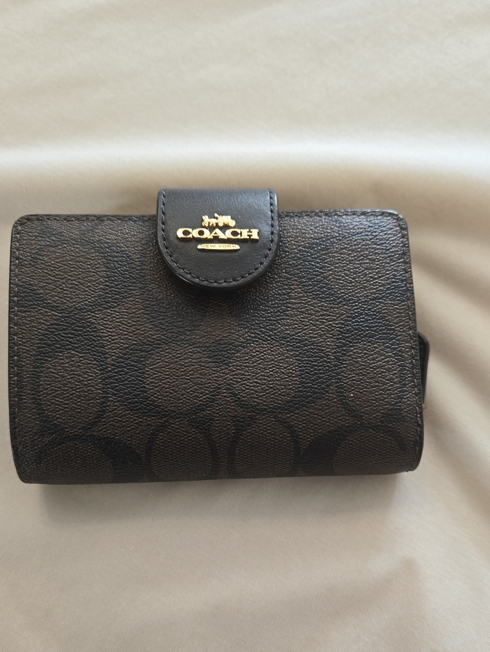 Coach Black Signature Compact Wallet with Gold Logo